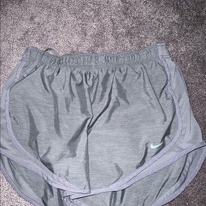 Two pairs of Nike running shorts